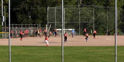 Ball field and players.